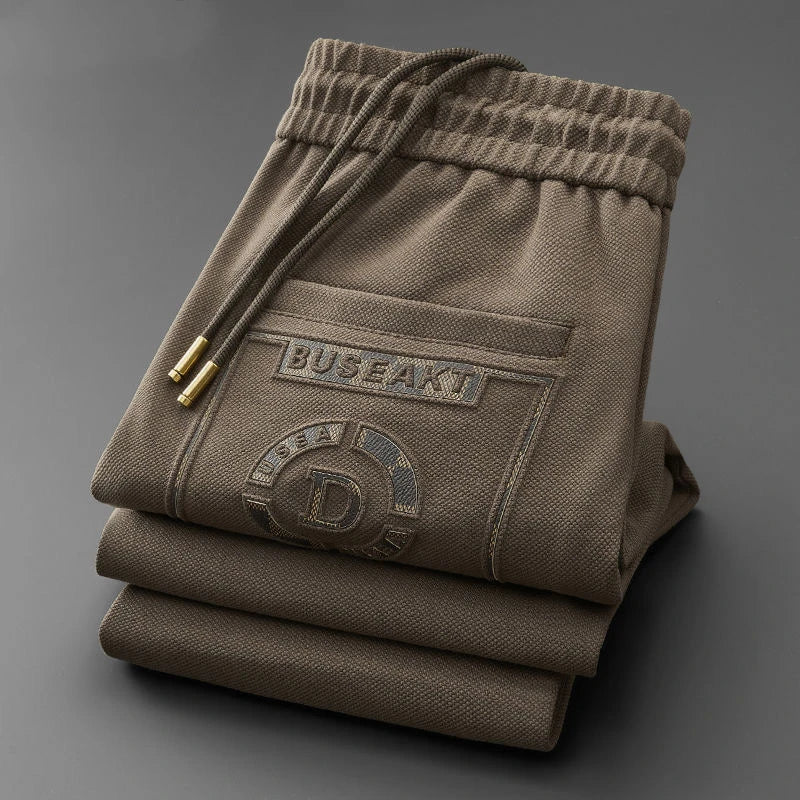 2025 Men's Luxury Embossed Pants – Cool Silk 9-Point Style